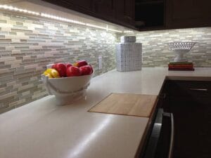 Kitchen with fruit bowl and mosaic tiles